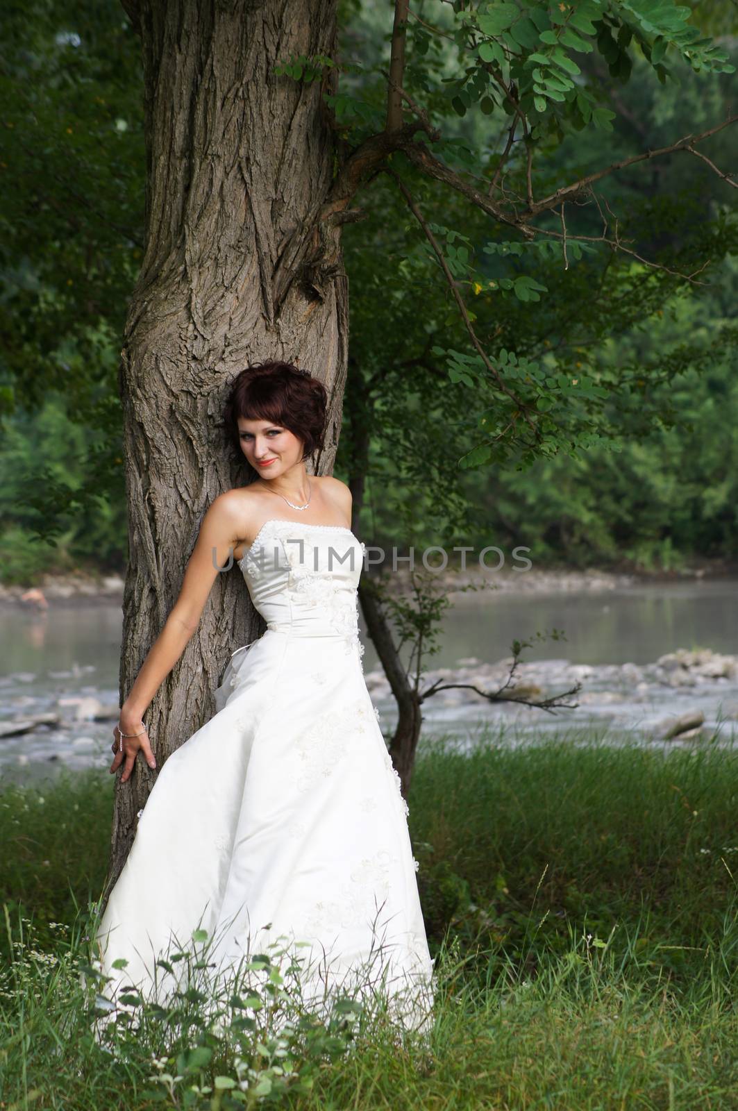 The young beautiful wife in the wedding day