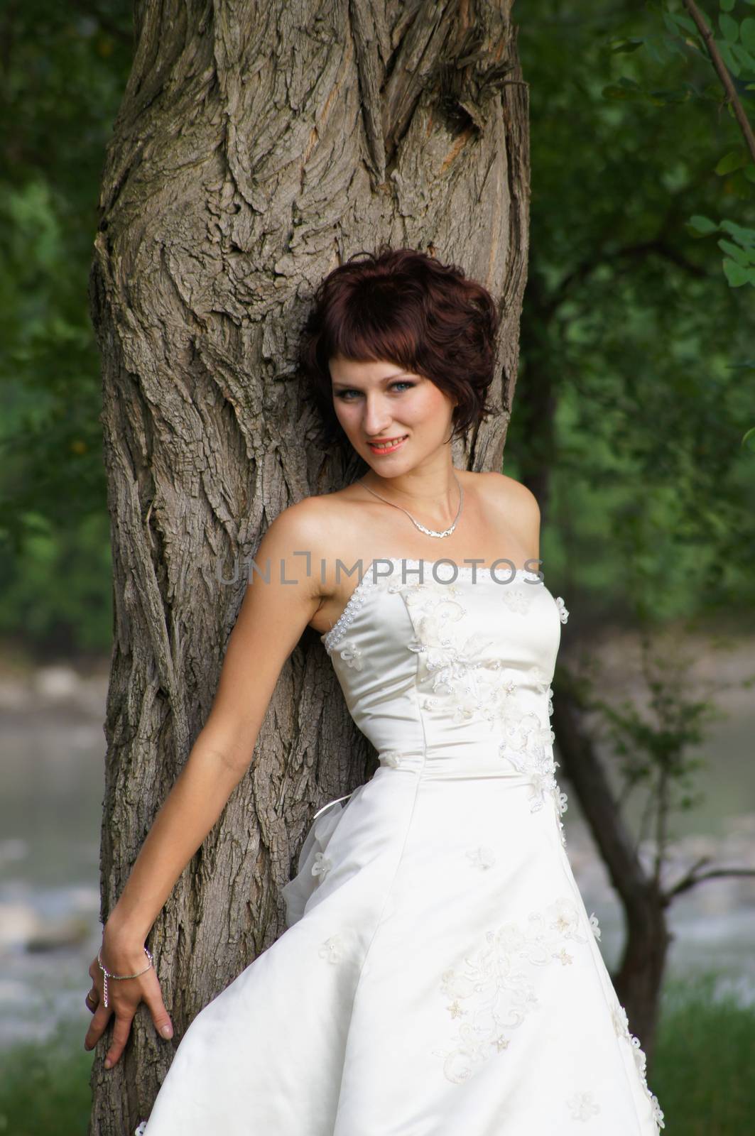 The young beautiful wife in the wedding day