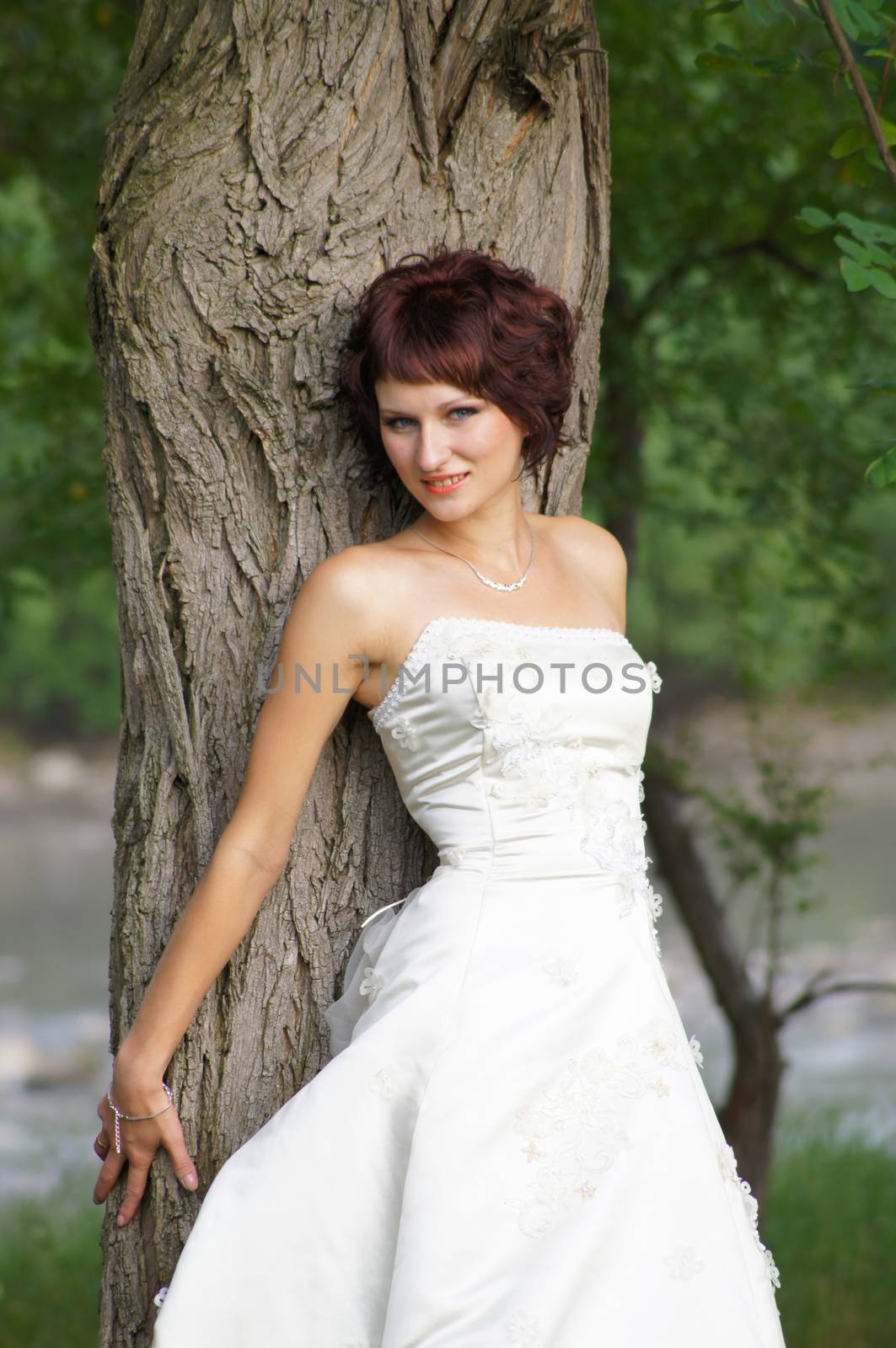 The young beautiful wife in the wedding day