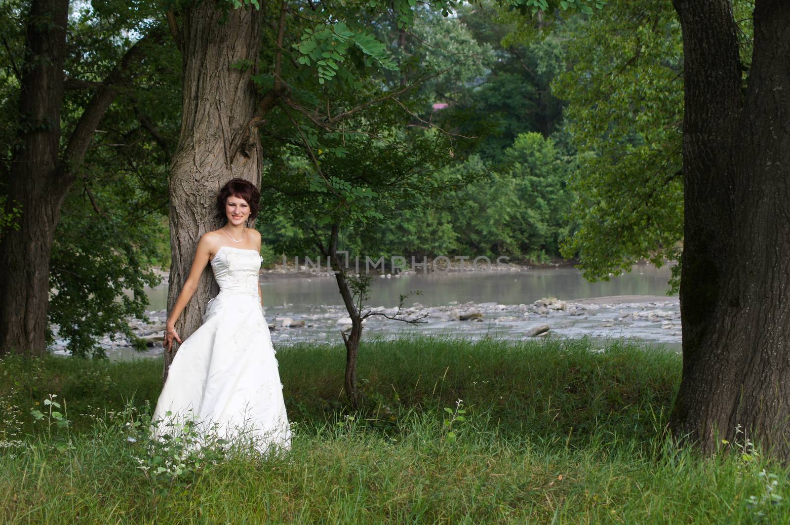 The young beautiful wife in the wedding day