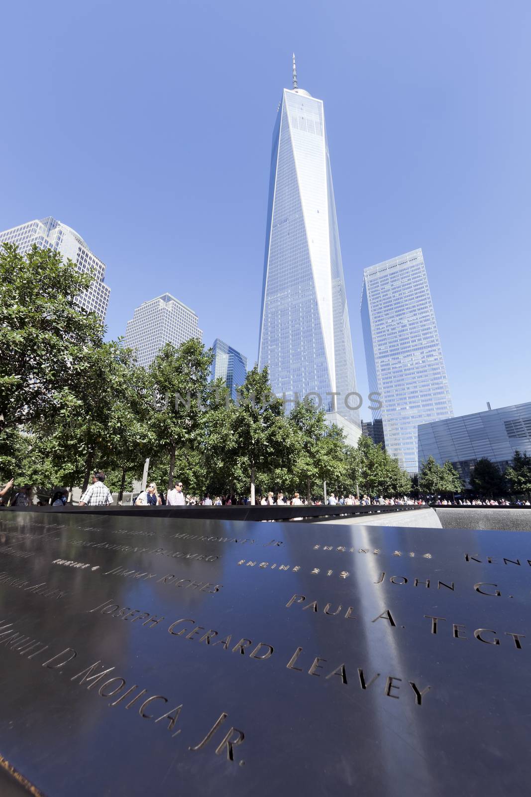 New York City, USA - September 27, 2014 : NYC's September 11 Memorial  in New York Downtown. The memorial was dedicated on the 10th anniversary of the Sept. 11, 2001 attacks.