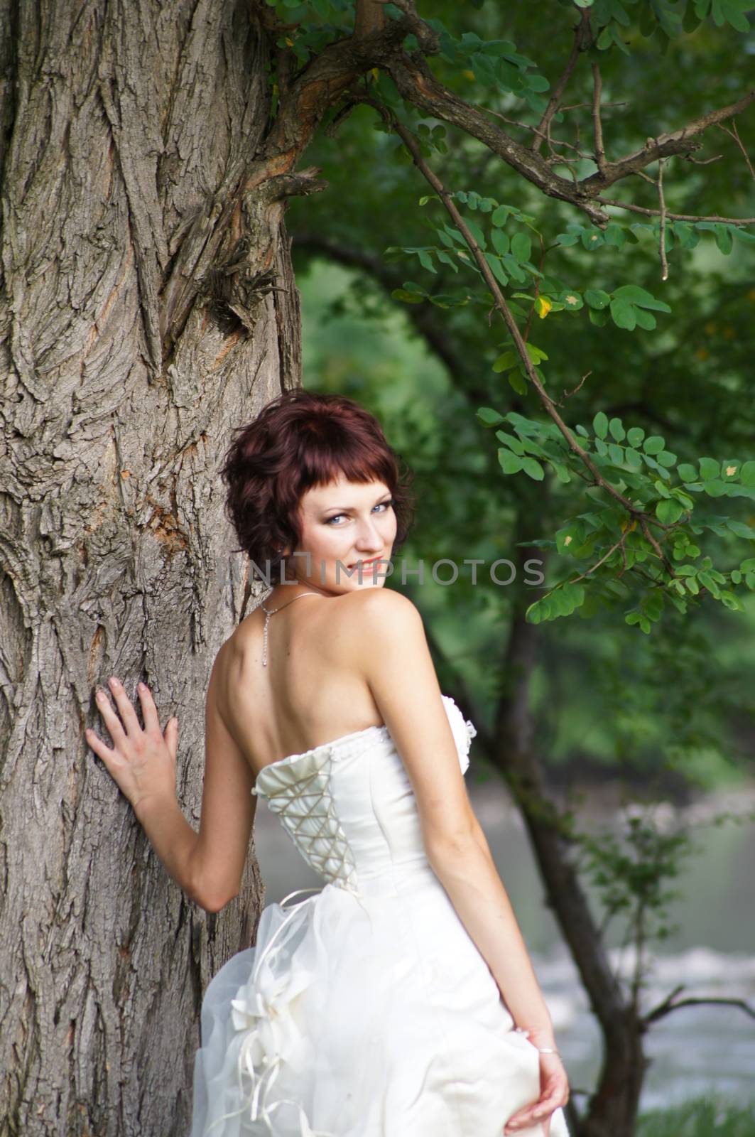 The young beautiful wife in the wedding day