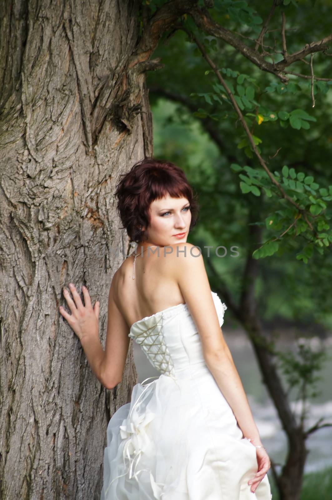 The young beautiful wife in the wedding day