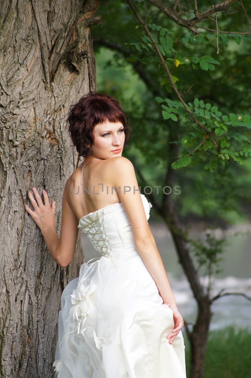 The young beautiful wife in the wedding day