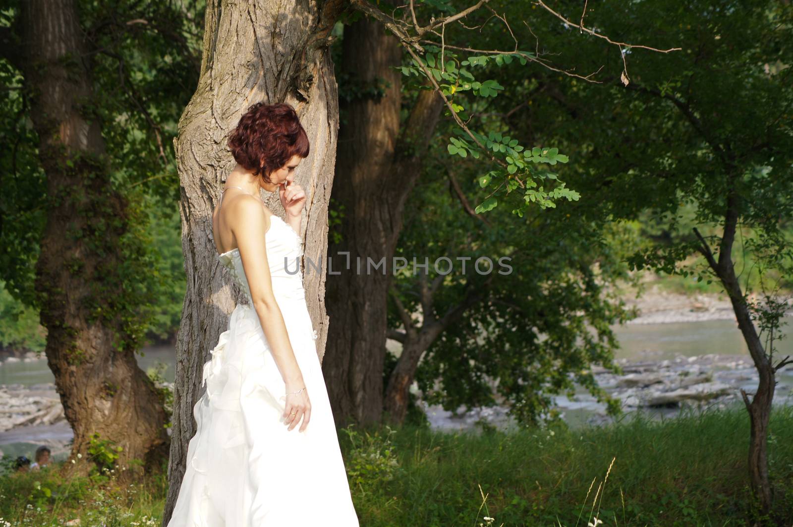 The young beautiful wife in the wedding day