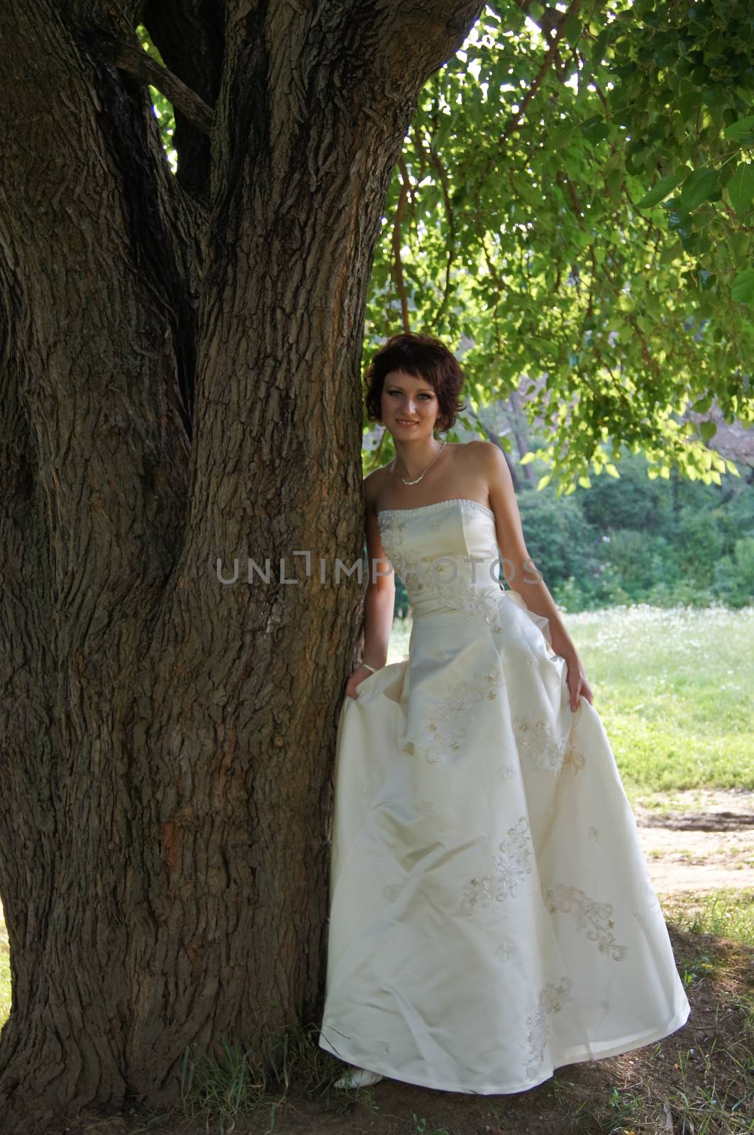 The young beautiful wife in the wedding day