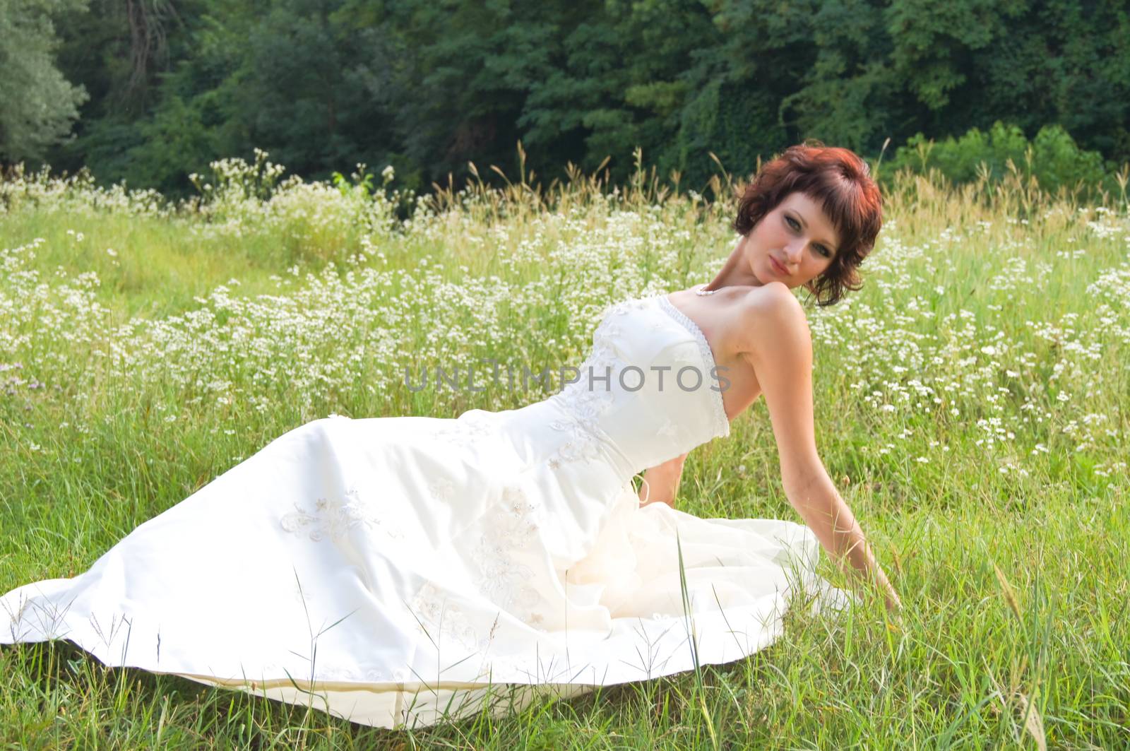 The young beautiful wife in the wedding day