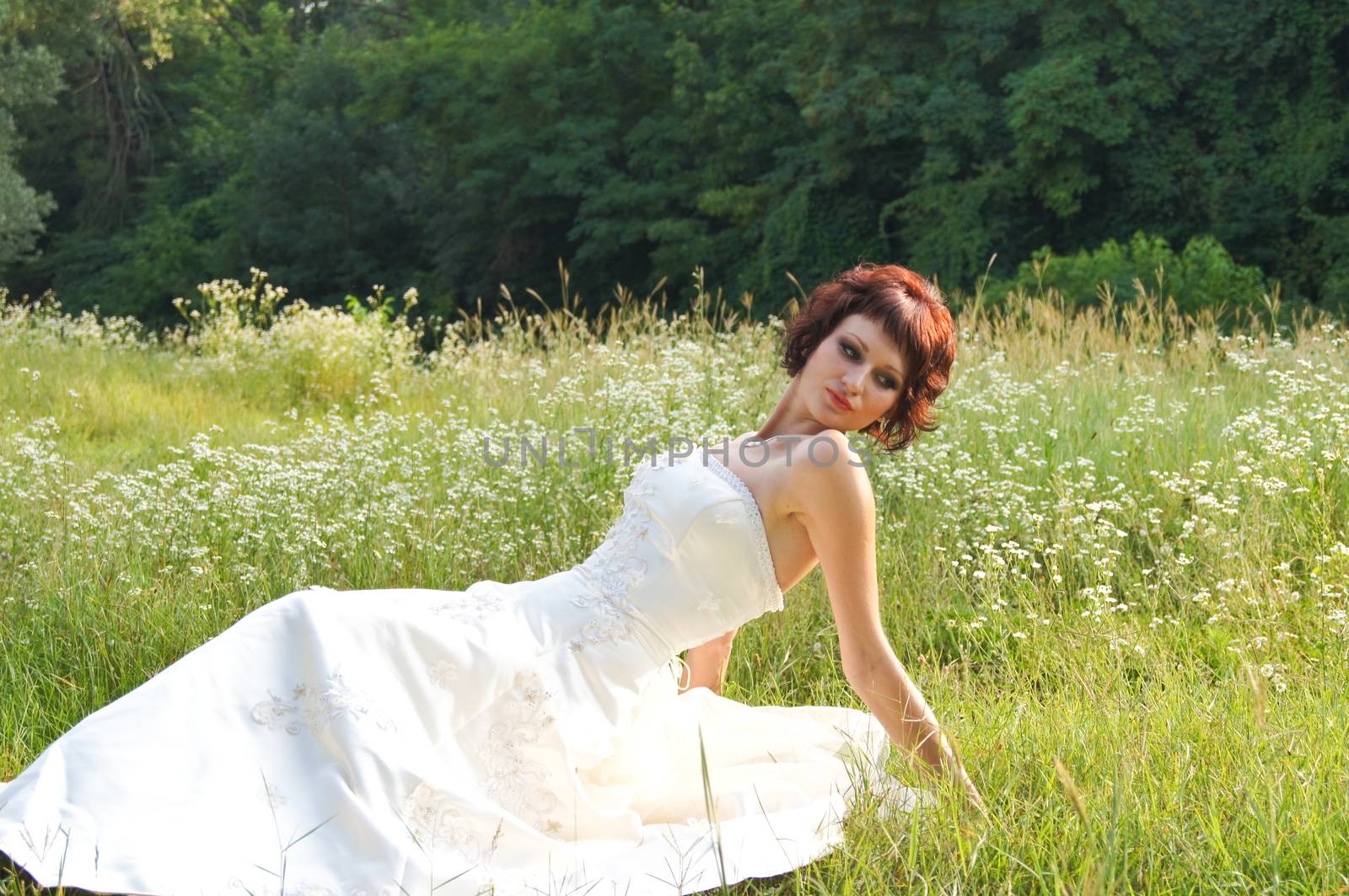 The young beautiful wife in the wedding day