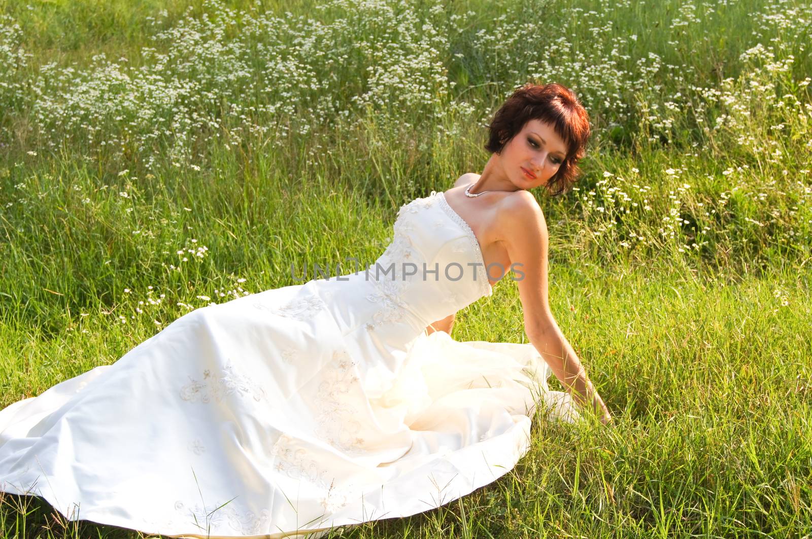 The young beautiful wife in the wedding day