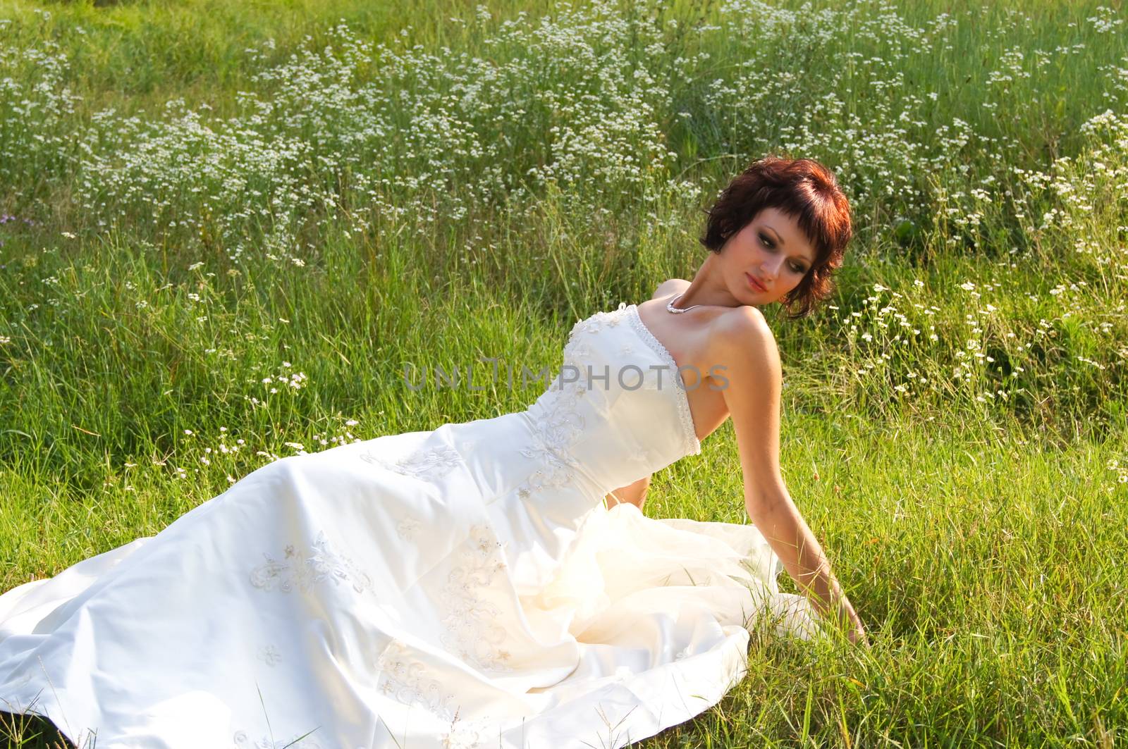 The young beautiful wife in the wedding day