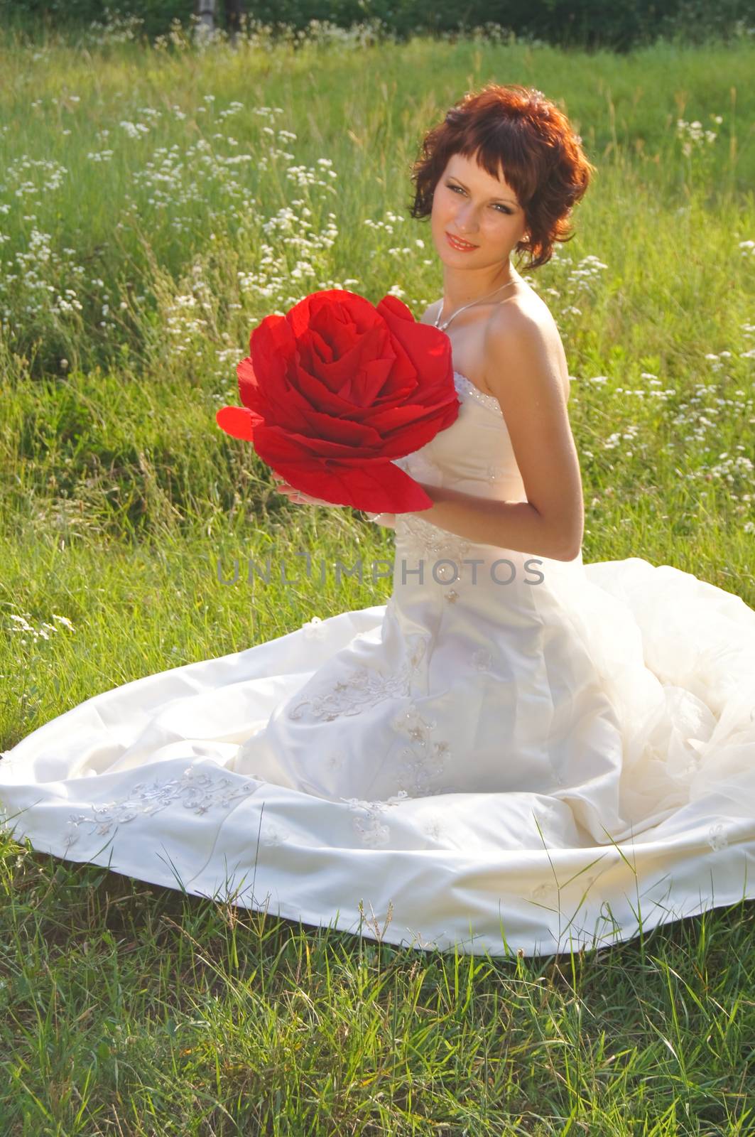 The young beautiful wife in the wedding day