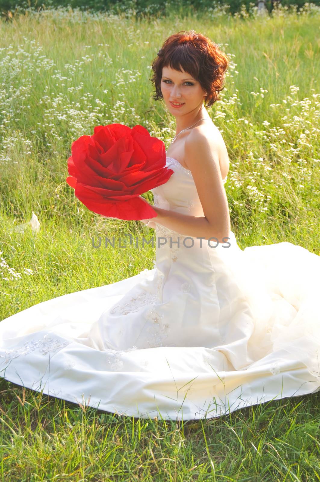 The young beautiful wife in the wedding day