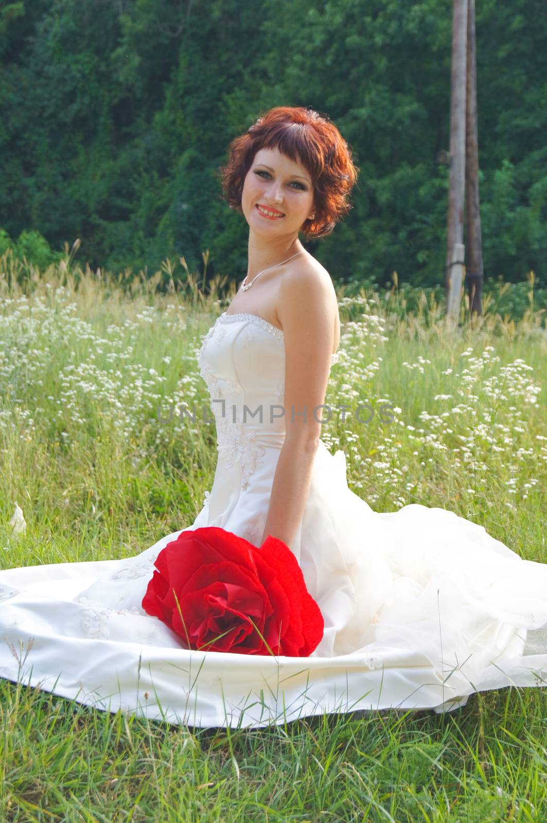 The young beautiful wife in the wedding day