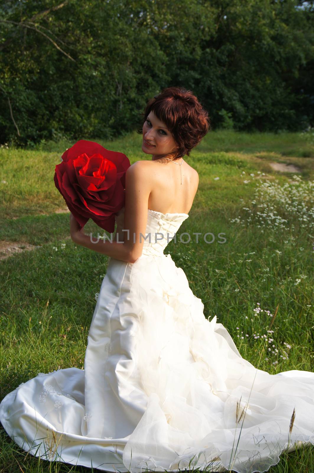 The young beautiful wife in the wedding day