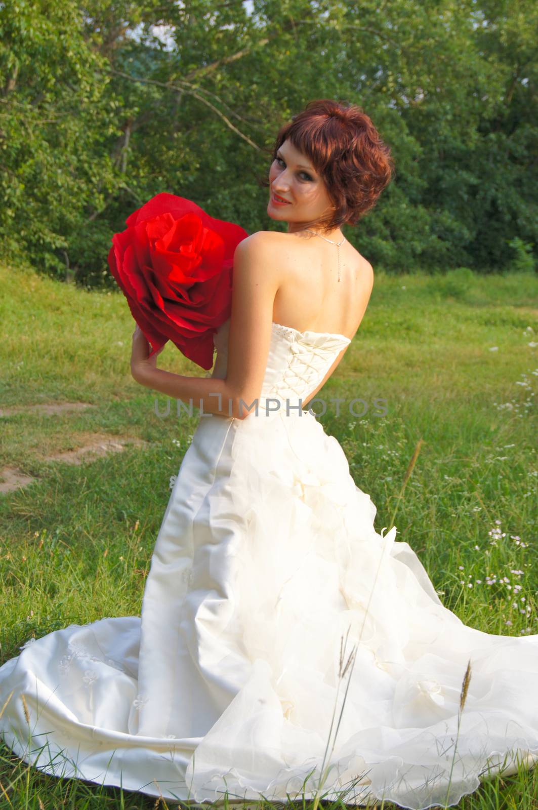 The young beautiful wife in the wedding day