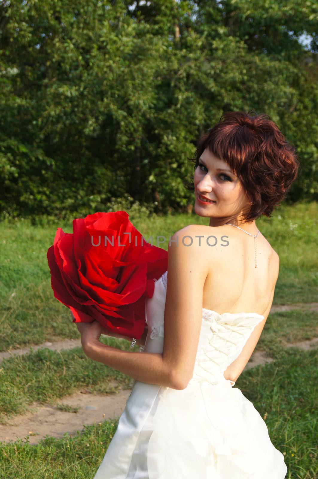 The young beautiful wife in the wedding day