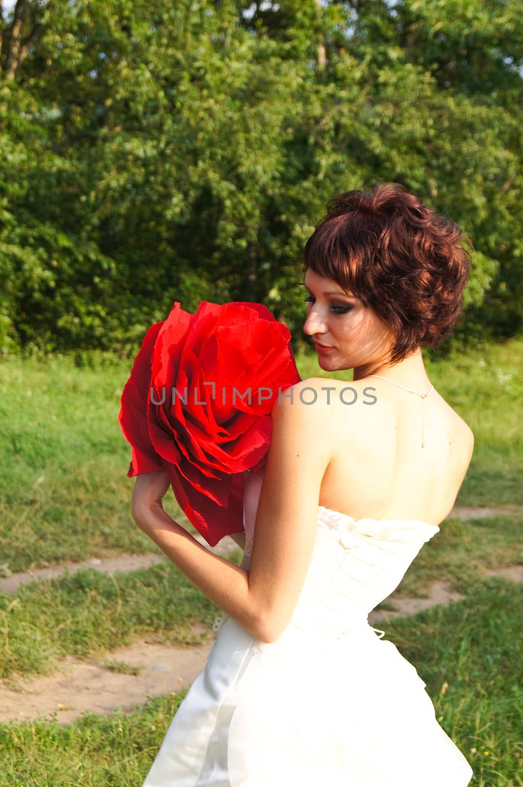 The young beautiful wife in the wedding day