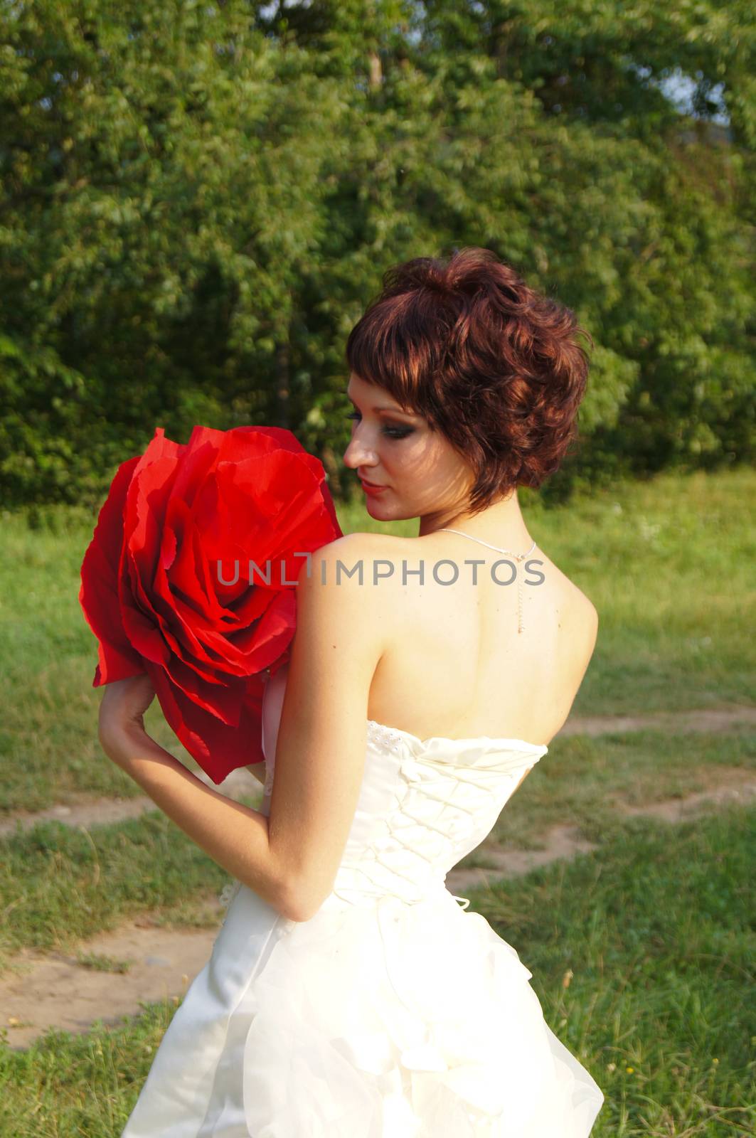 The young beautiful wife in the wedding day