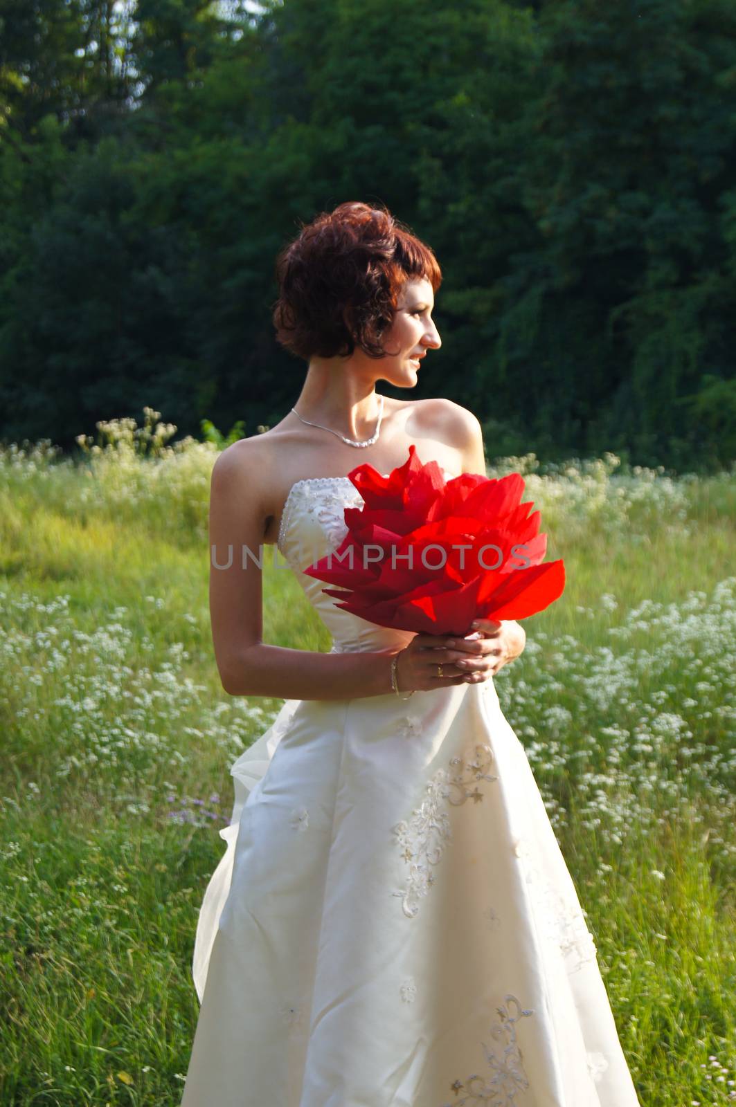 The young beautiful wife in the wedding day