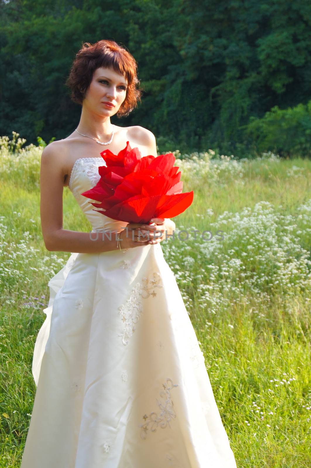 The young beautiful wife in the wedding day