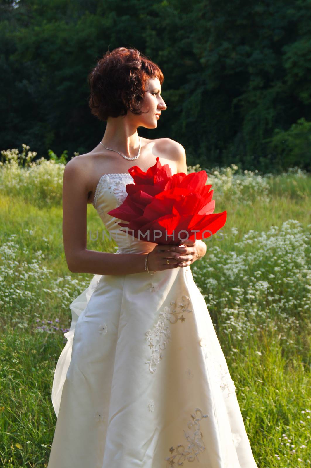 The young beautiful wife in the wedding day