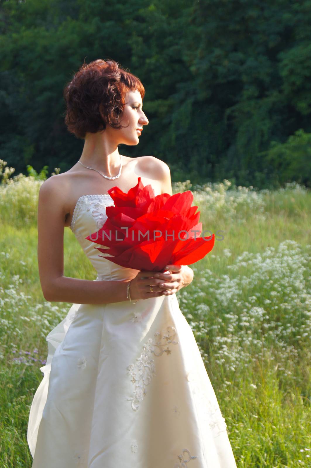 The young beautiful wife in the wedding day