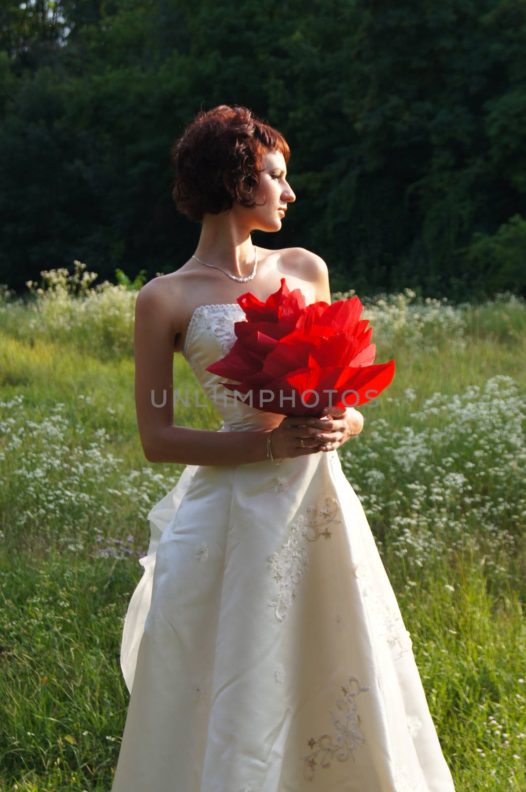 The young beautiful wife in the wedding day