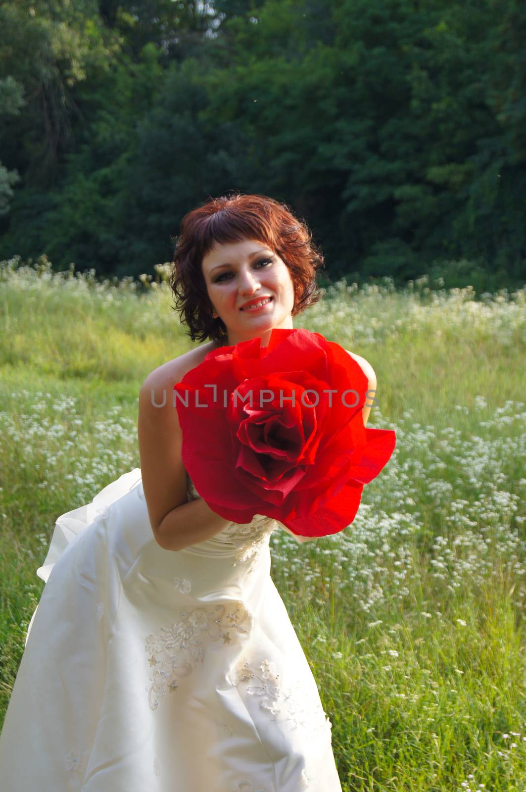 The young beautiful wife in the wedding day