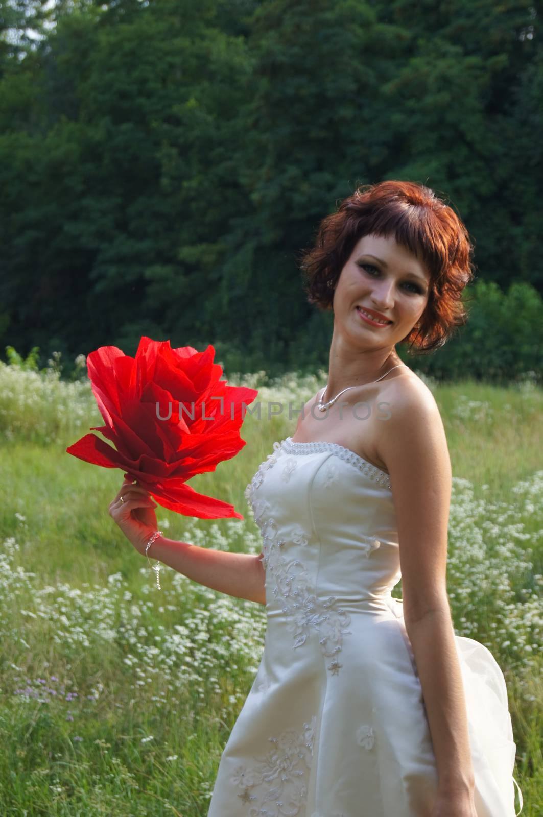 The young beautiful wife in the wedding day