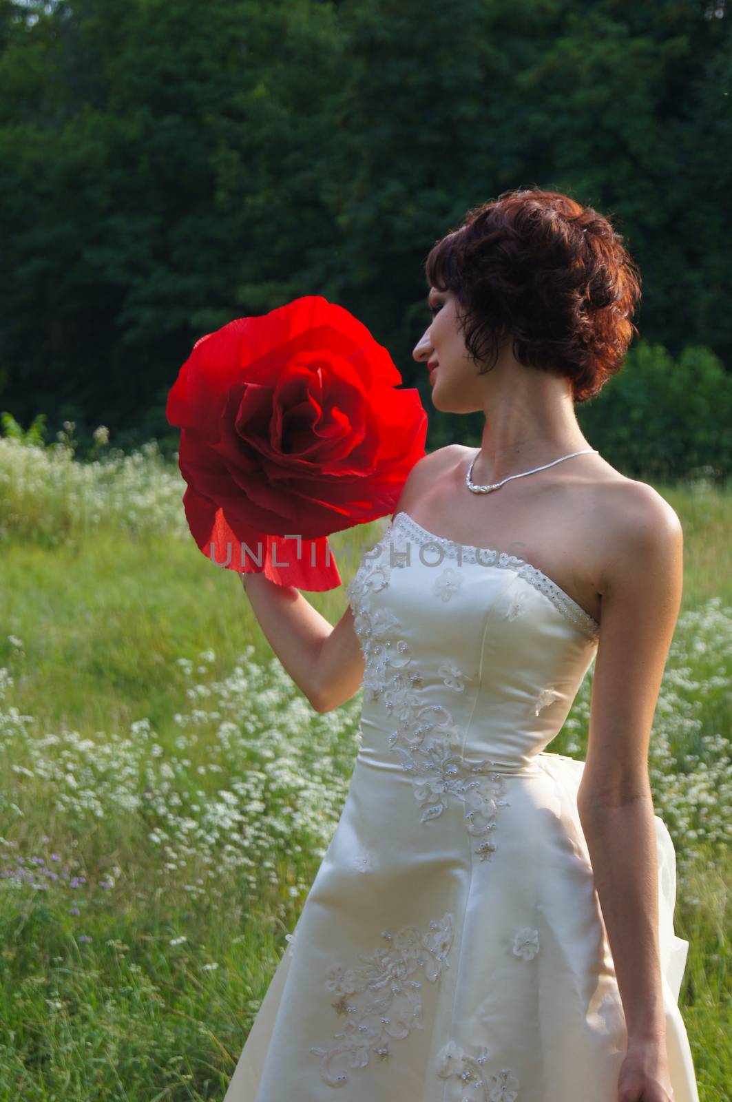 The young beautiful wife in the wedding day