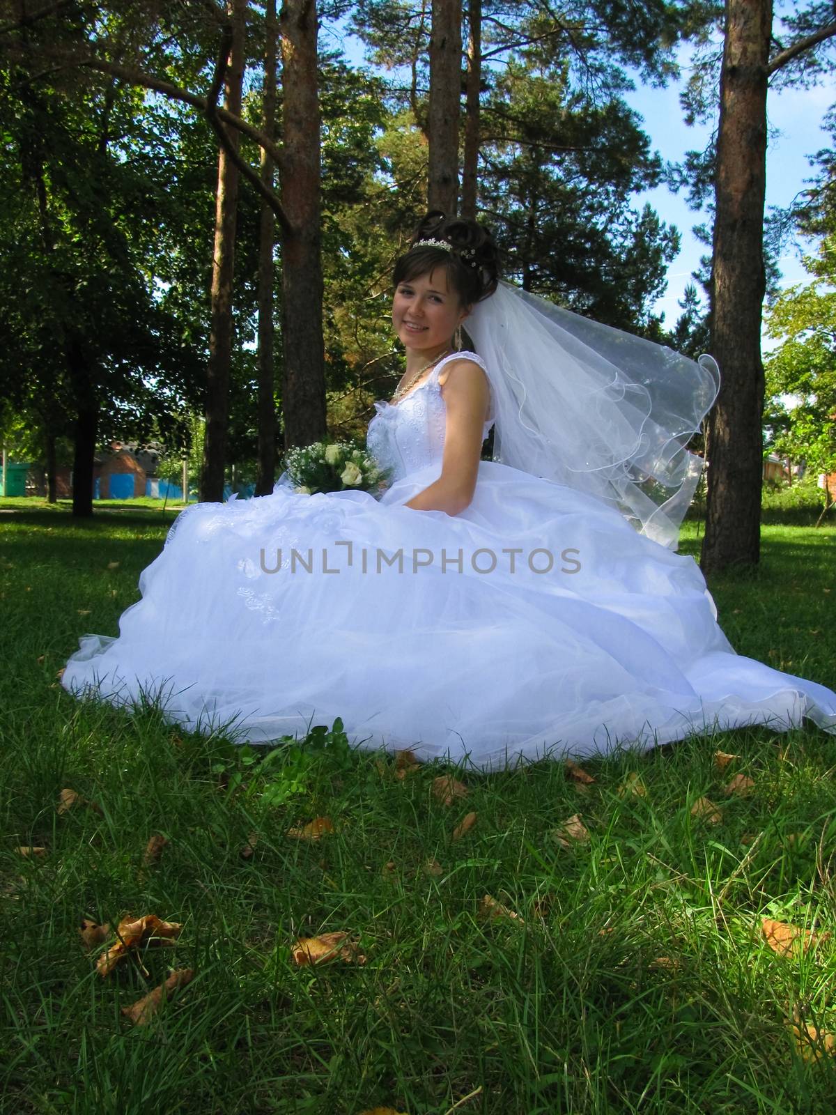 The young beautiful wife in the wedding day