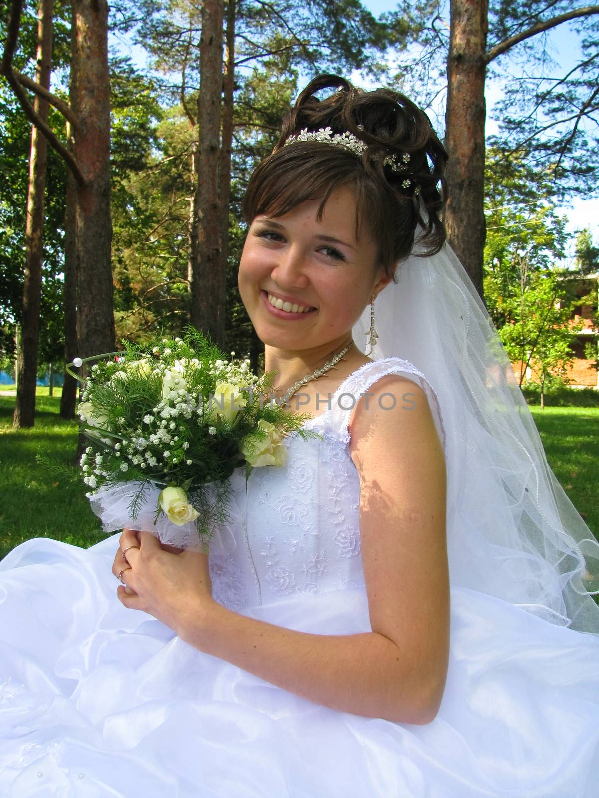 The young beautiful wife in the wedding day