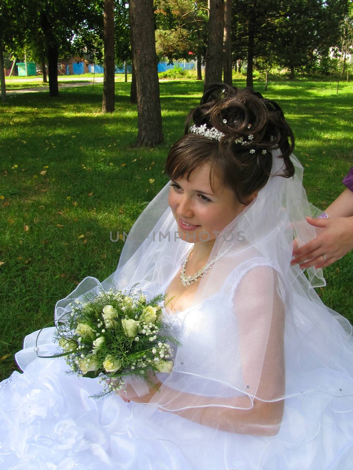 The young beautiful wife in the wedding day