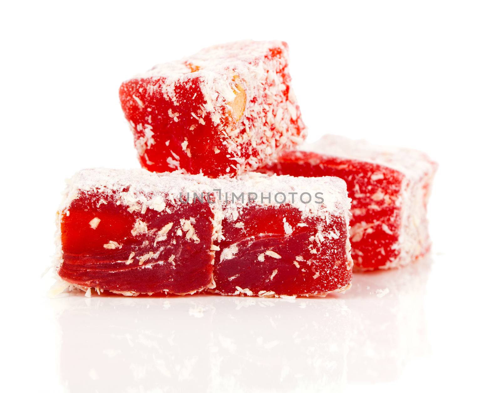 Sweet pieces of turkish delight on white background