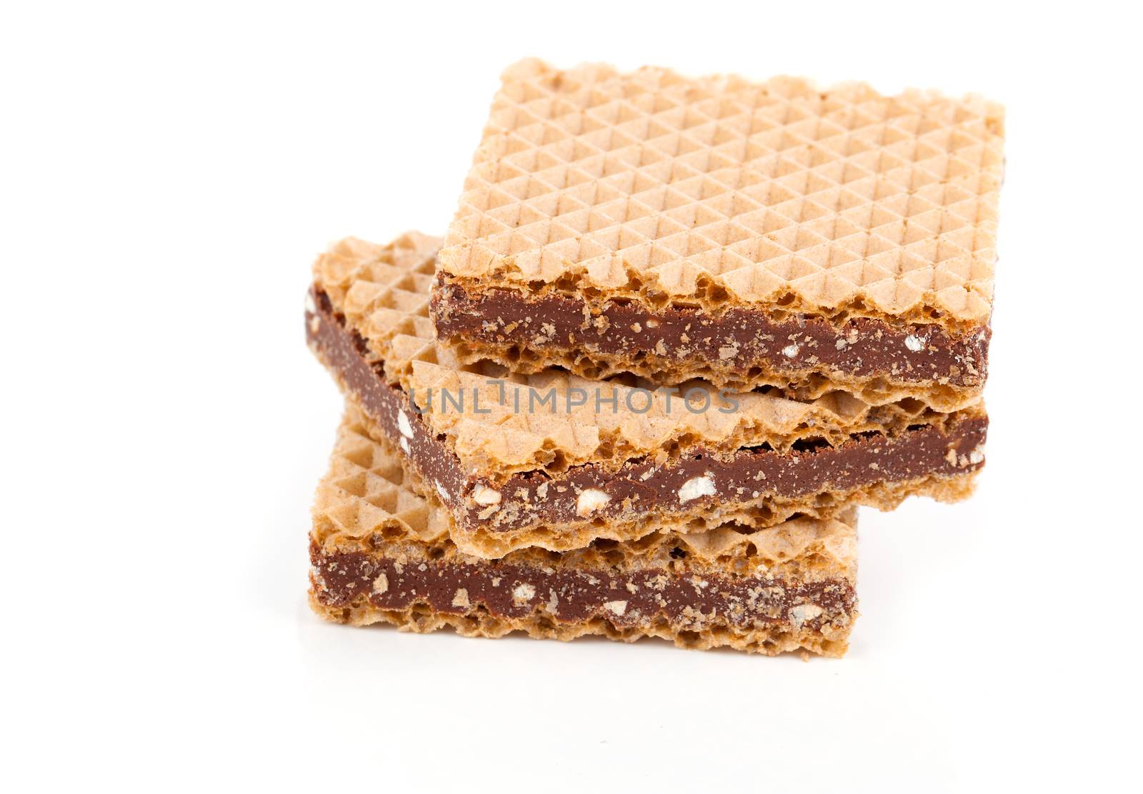 Wafers with chocolate on a white background