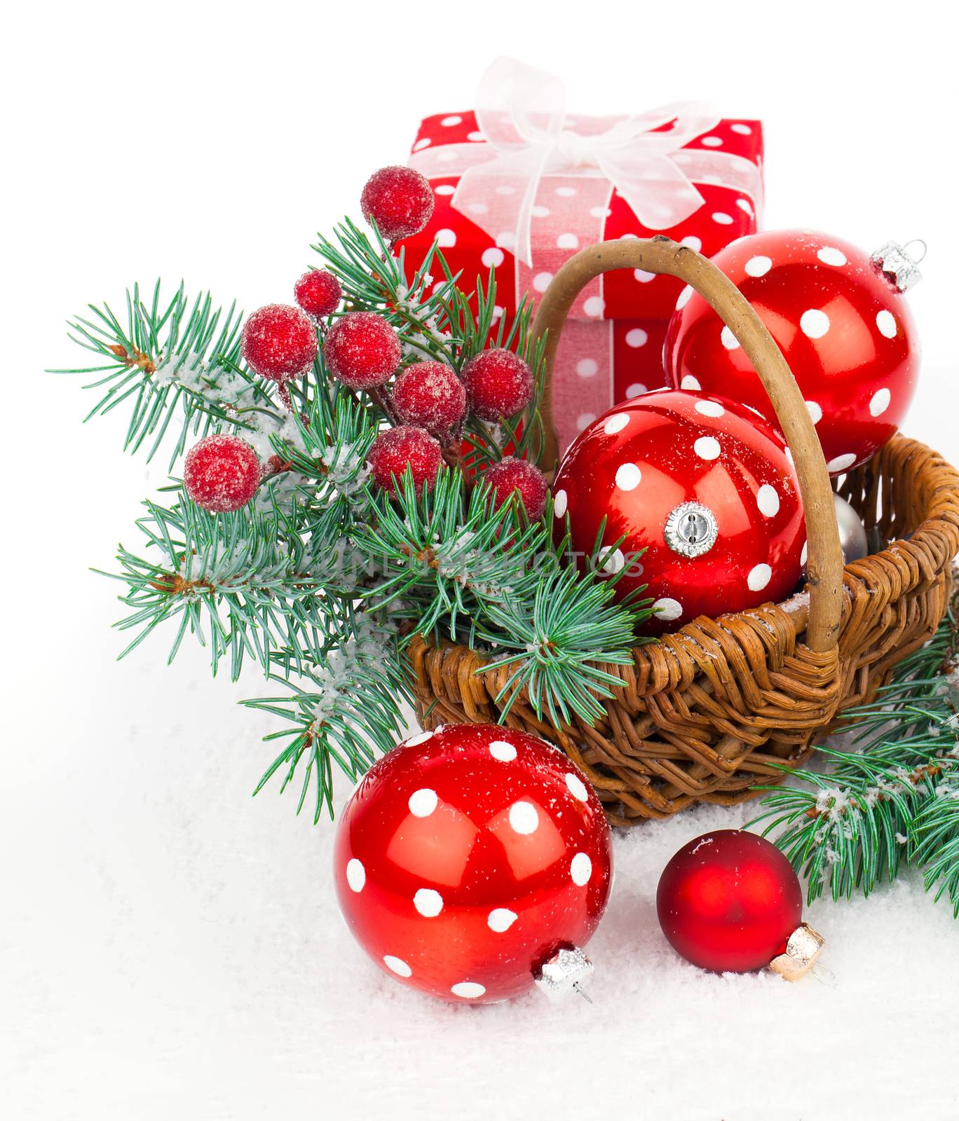 Christmas balls and fir branches with decorations isolated over  by motorolka