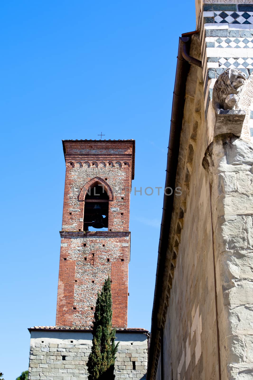 An old red medieval tower in Pistoia
