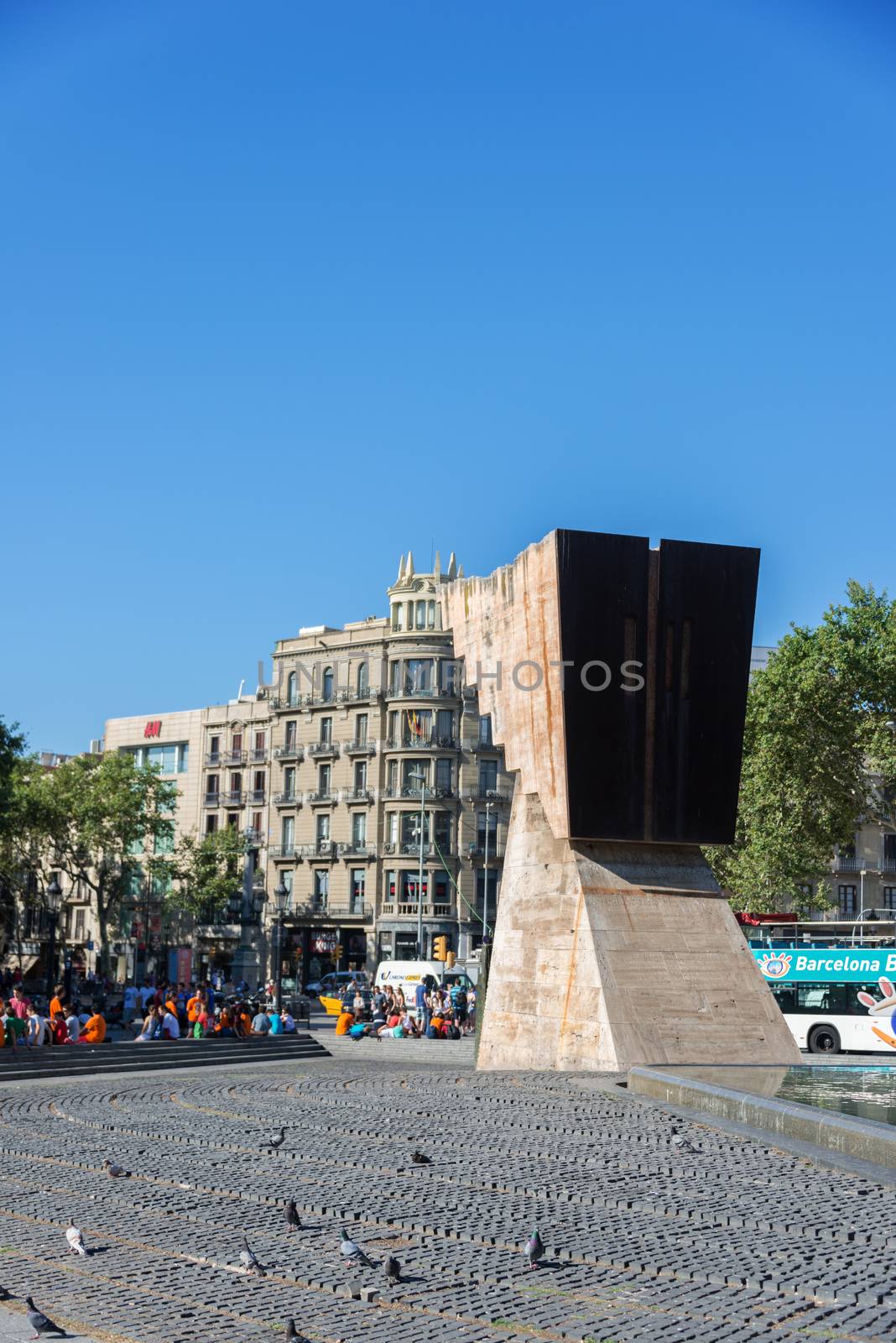 BARCELONA, SPAIN - JULY 19: Macia Monument in Plaza Cataluna on July 19, 2012 in Barcelona, Spain. This monument designed by Subirachs in honor of president dominates the square, the city centre