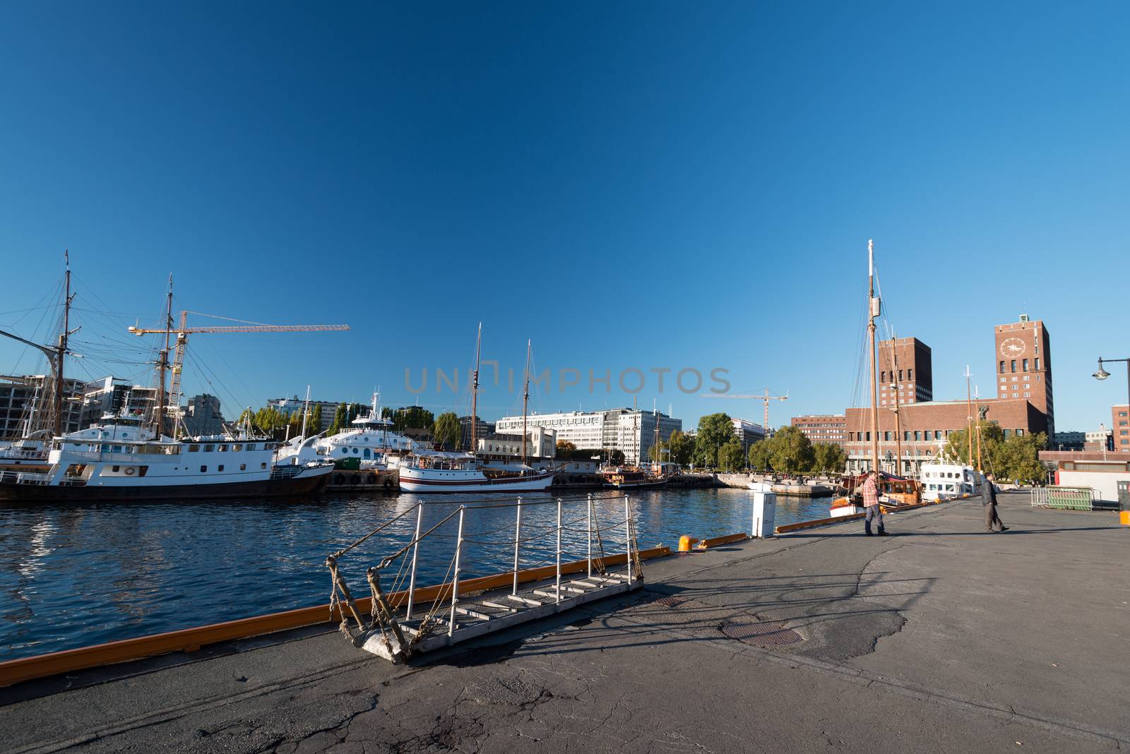 OSLO - OCTOBER 10: Aker Brygge on October 10, 2013 in Oslo. Old shipyard turned in modern and trendy area.