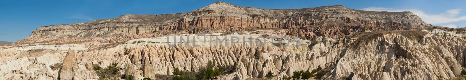 Wide panoramic photo of beautiful mountains near Goreme, Cappadocia, Turkey