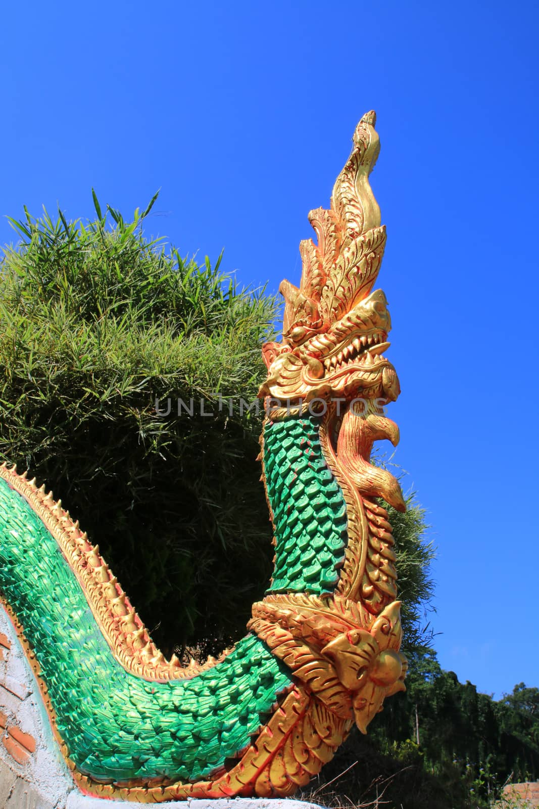 The sculpture king of nagas usually decor at the stair in public temple of Thailand.