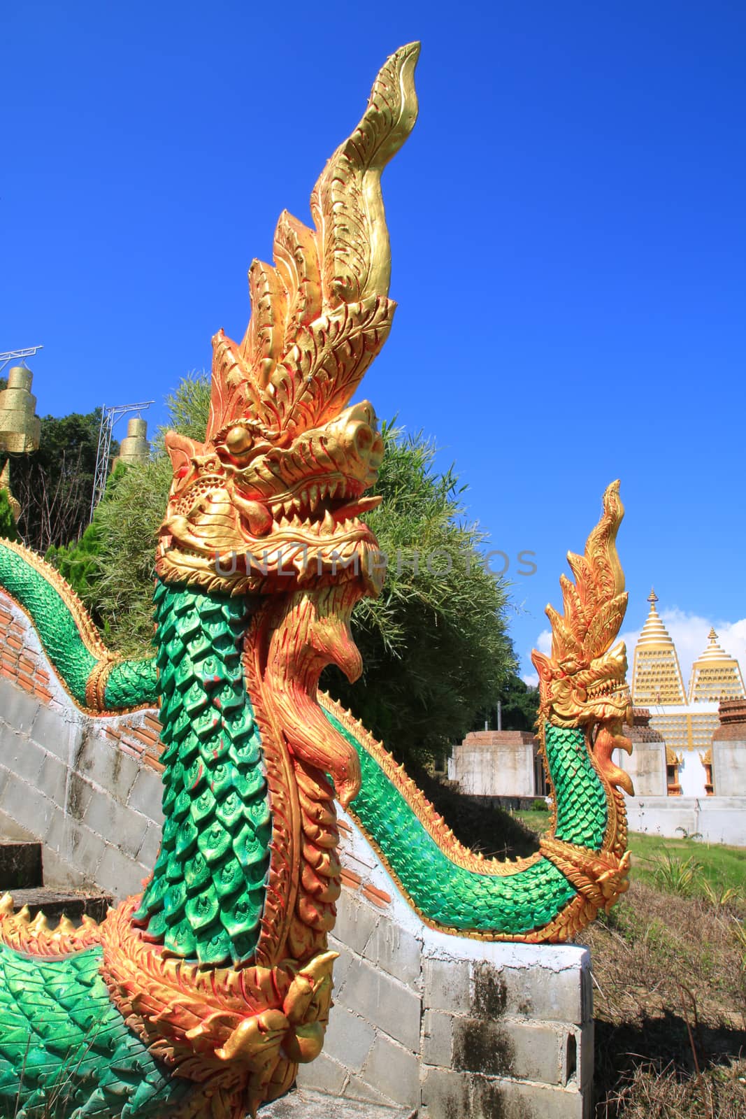 The sculpture king of nagas usually decor at the stair in public temple of Thailand.