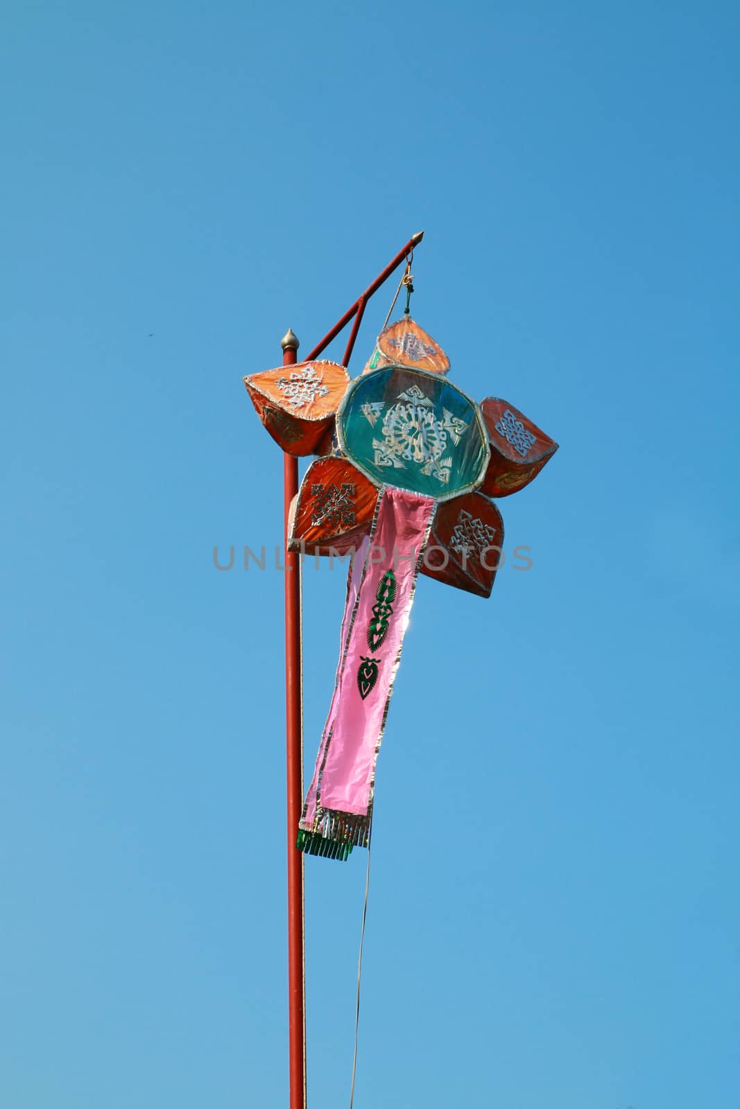 Traditional paper lantern is hanging on the pole.