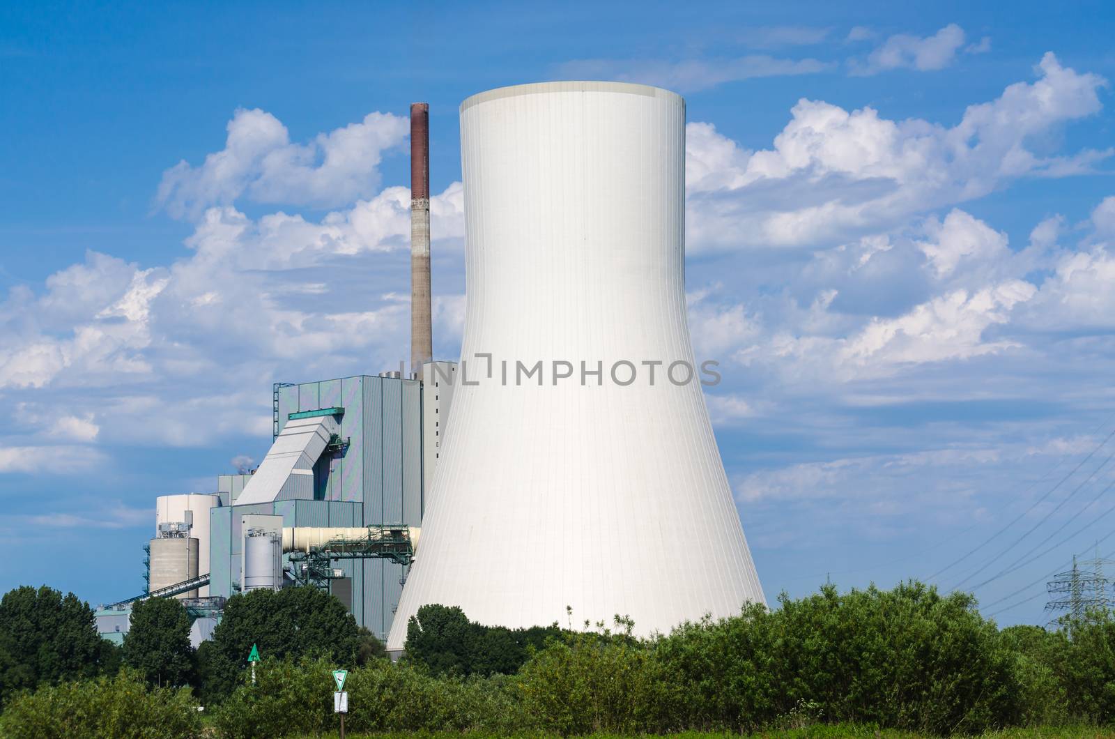 Coal-fired power plant on the Rhine opposite the ferry dock in Orsay