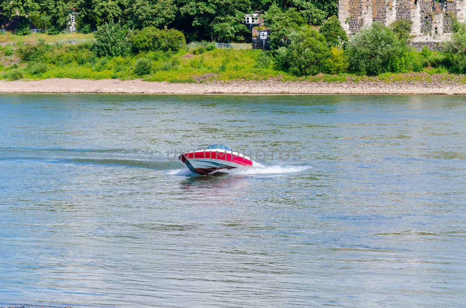 Speedboat cruising in the lake.
