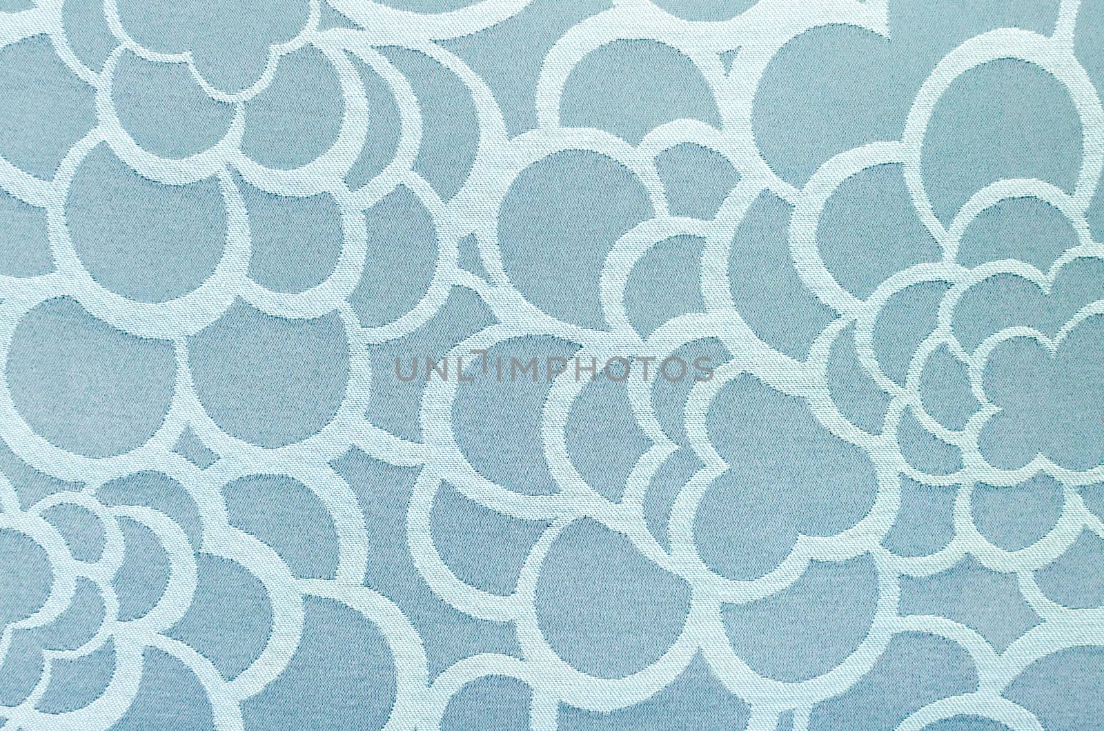 Abstract blue circle fabric texture and background.