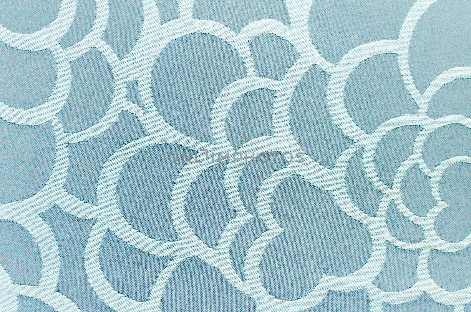 Abstract blue circle fabric texture and background.