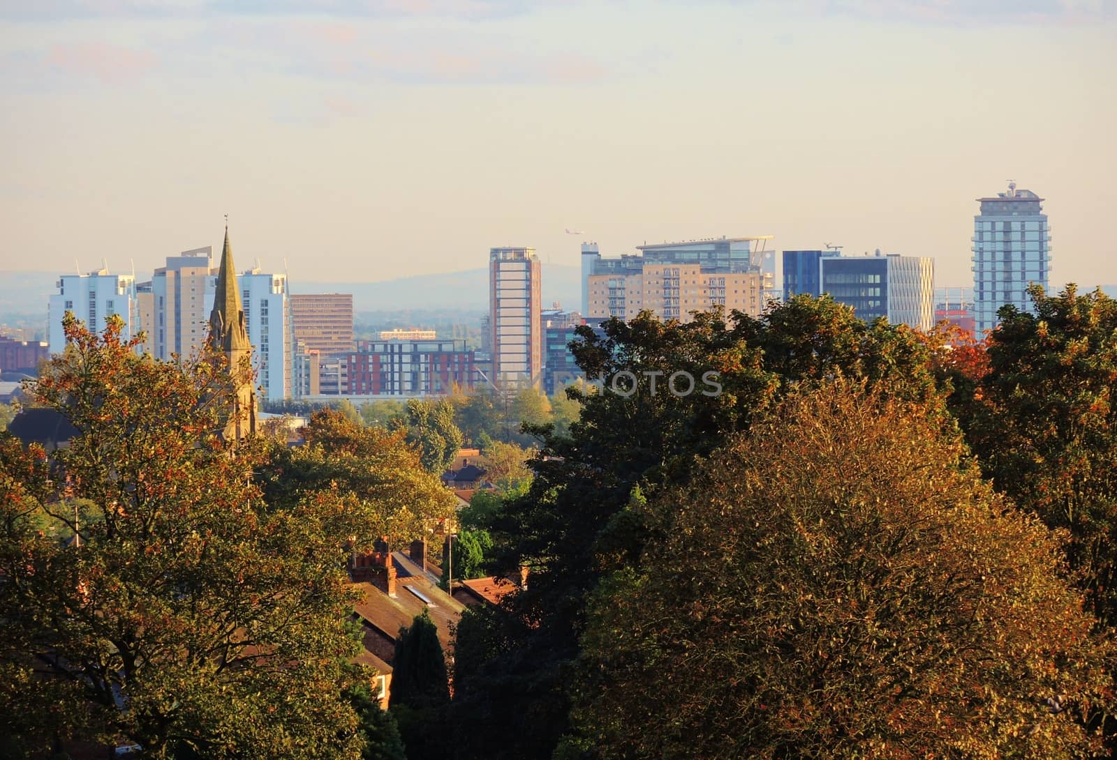 A colourful image of a City park in the Autumn.