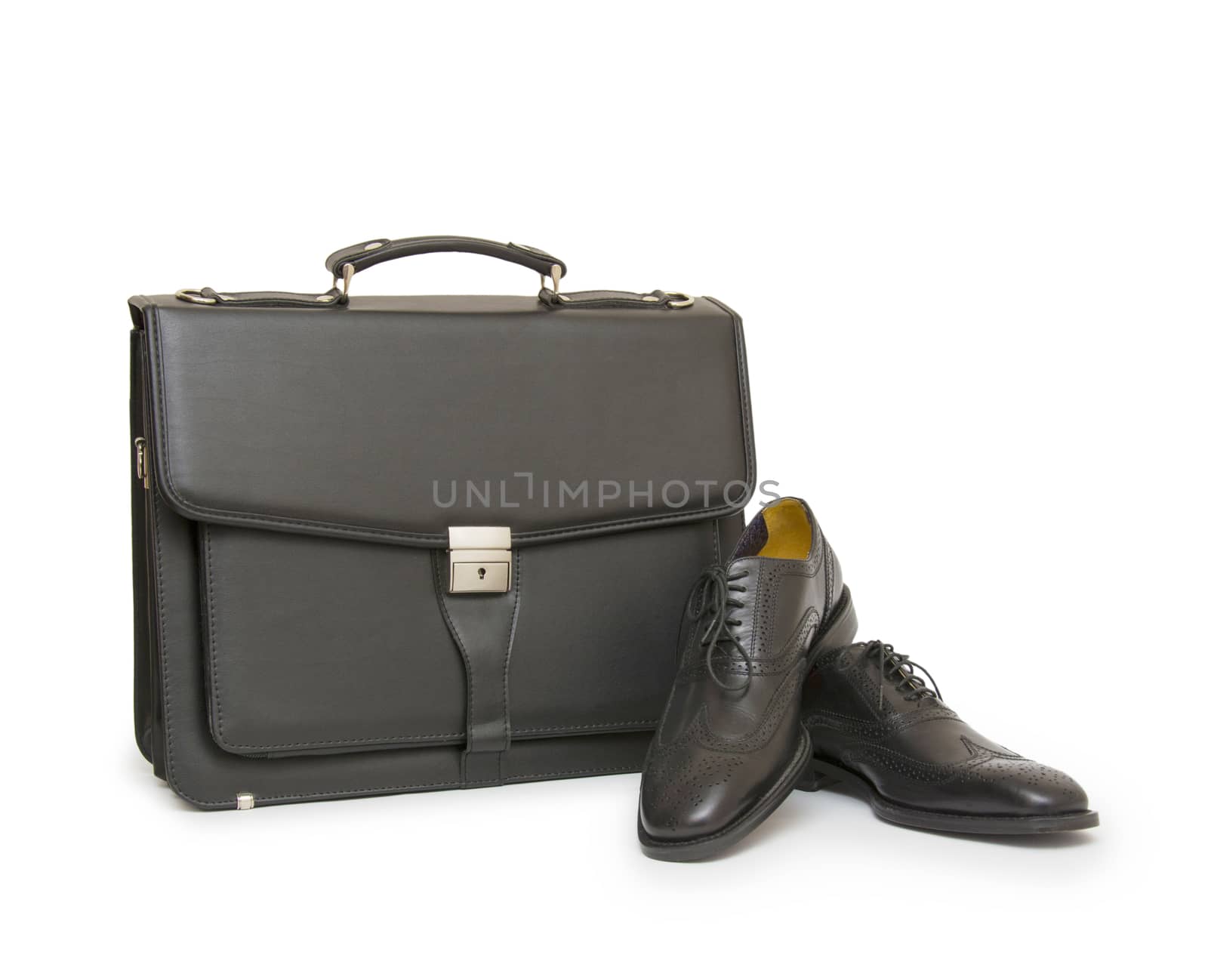 Shoes and bag on white background