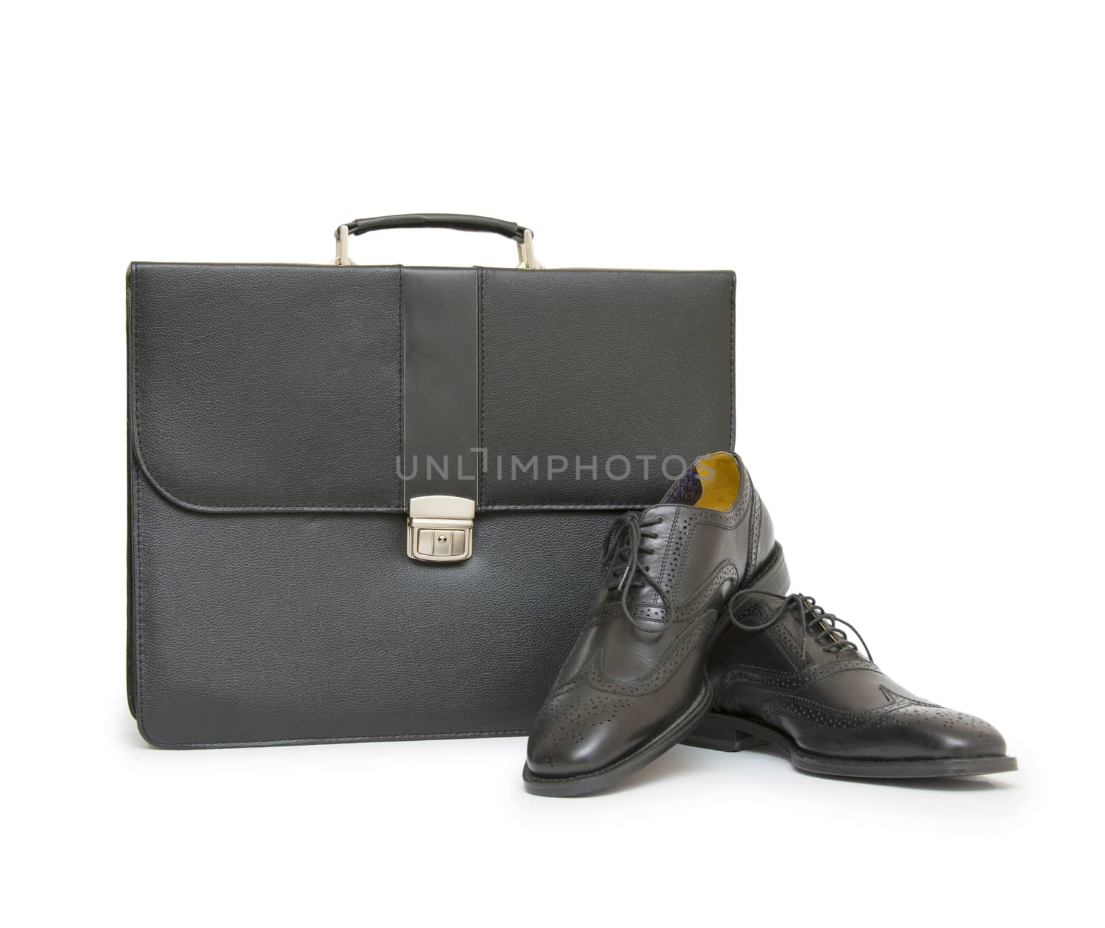 Shoes and bag on white background